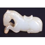 A CHINESE CARVED GREENISH WHITE JADE FIGURE OF A HORSE 20th Century. 4.5 cm x 2.75 cm.