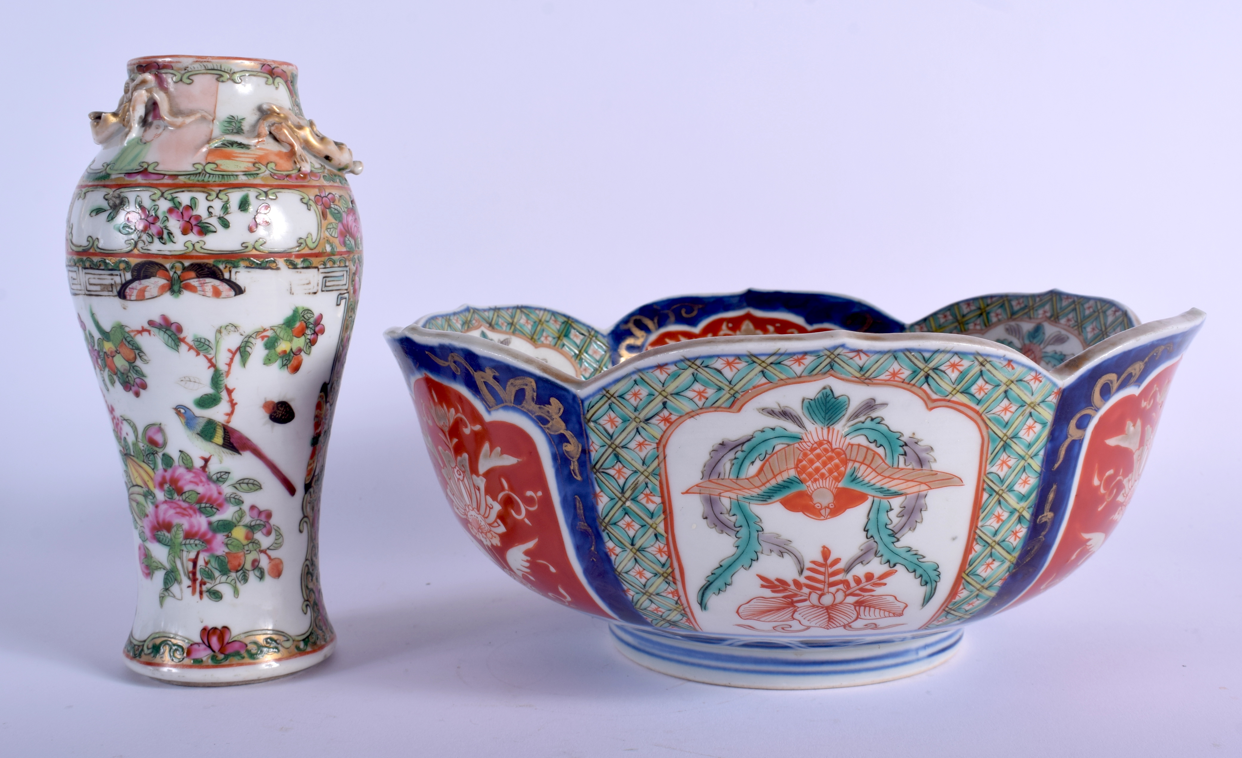 A 19TH CENTURY JAPANESE MEIJI PERIOD IMARI BOWL together with a canton famille rose vase. Largest 2