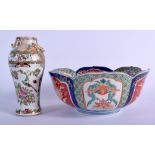 A 19TH CENTURY JAPANESE MEIJI PERIOD IMARI BOWL together with a canton famille rose vase. Largest 2