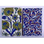 TWO MIDDLE EASTERN ISLAMIC FAIENCE IZNIK TILES painted with scrolling foliage. 24 cm x 16 cm. (2)