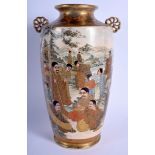 A 19TH CENTURY JAPANESE MEIJI PERIOD SATSUMA VASE painted with immortals. 25.5 cm high.