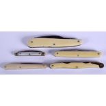 FOUR ANTIQUE IVORY CASED KNIVES together with a smaller knife. (5)