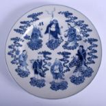 A 19TH CENTURY CHINESE BLUE AND WHITE PORCELAIN PLATE Qing, painted with Buddhistic figures. 24.5 c