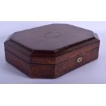 AN ANTIQUE LEATHER CASED VANITY BOX tooled with gilt motifs, inset with a mirror. 30 cm x 22 cm.