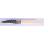 AN ANTIQUE CARVED CONTINENTAL RHINOCEROS HORN AND IVORY PAPER KNIFE. 35 cm long.