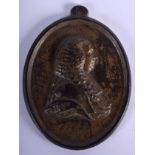 AN 18TH CENTURY CONTINENTAL GILDED IRON PLAQUE OF A MALE depicting a gentleman. 9 cm x 11.5 cm.