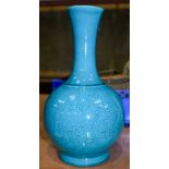 A Chinese Turquoise ground yuhuchunping vase decorated with a dragon 24 cm