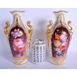 Coalport pair of vases painted with flowers. 25Cm high