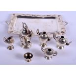 AN UNUSUAL EARLY 20TH CENTURY MINIATURE SILVER TEASET. (qty)