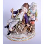 A 19TH CENTURY MEISSEN PORCELAIN FIGURE OF A BOY AND GIRL modelled seated upon a sledge. 15 cm x 10