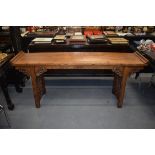 A LARGE 19TH CENTURY CHINESE PROVINCIAL CARVED LIGHT ELM ALTAR TABLE modelled in the Ming style, fo