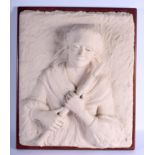 A LARGE MID 20TH CENTURY CARVED PLASTER POTTERY WALL PLAQUE modelled as a pipe player. 62 cm x 42 c
