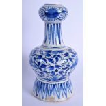 AN 18TH CENTURY DELFT BLUE AND WHITE FAIENCE GLAZED VASE painted with foliage. 18 cm high.