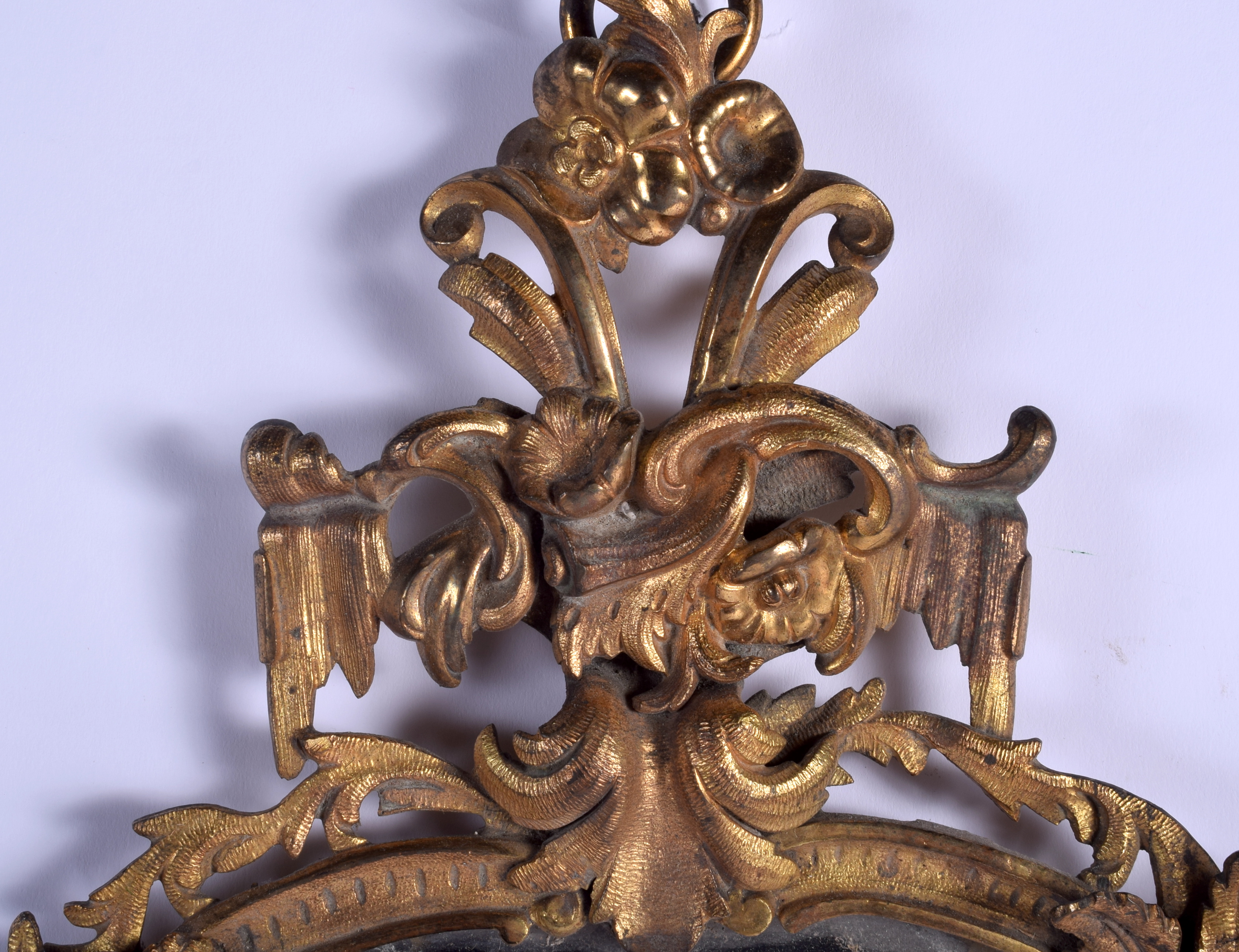 A 19TH CENTURY FRENCH GILT BRONZE MIRROR encased within foliage and a bird. 50 cm x 30 cm. - Image 2 of 4