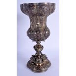 A 19TH CENTURY CONTINENTAL SILVER PLATED GOBLET decorated with serpents, figures etc. 22 cm high.