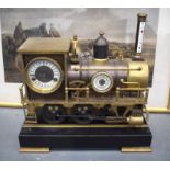 A LARGE CONTEMPORARY CONTINENTAL LOCOMOTIVE TRAIN CLOCK upon a track. 44 cm x 46 cm.