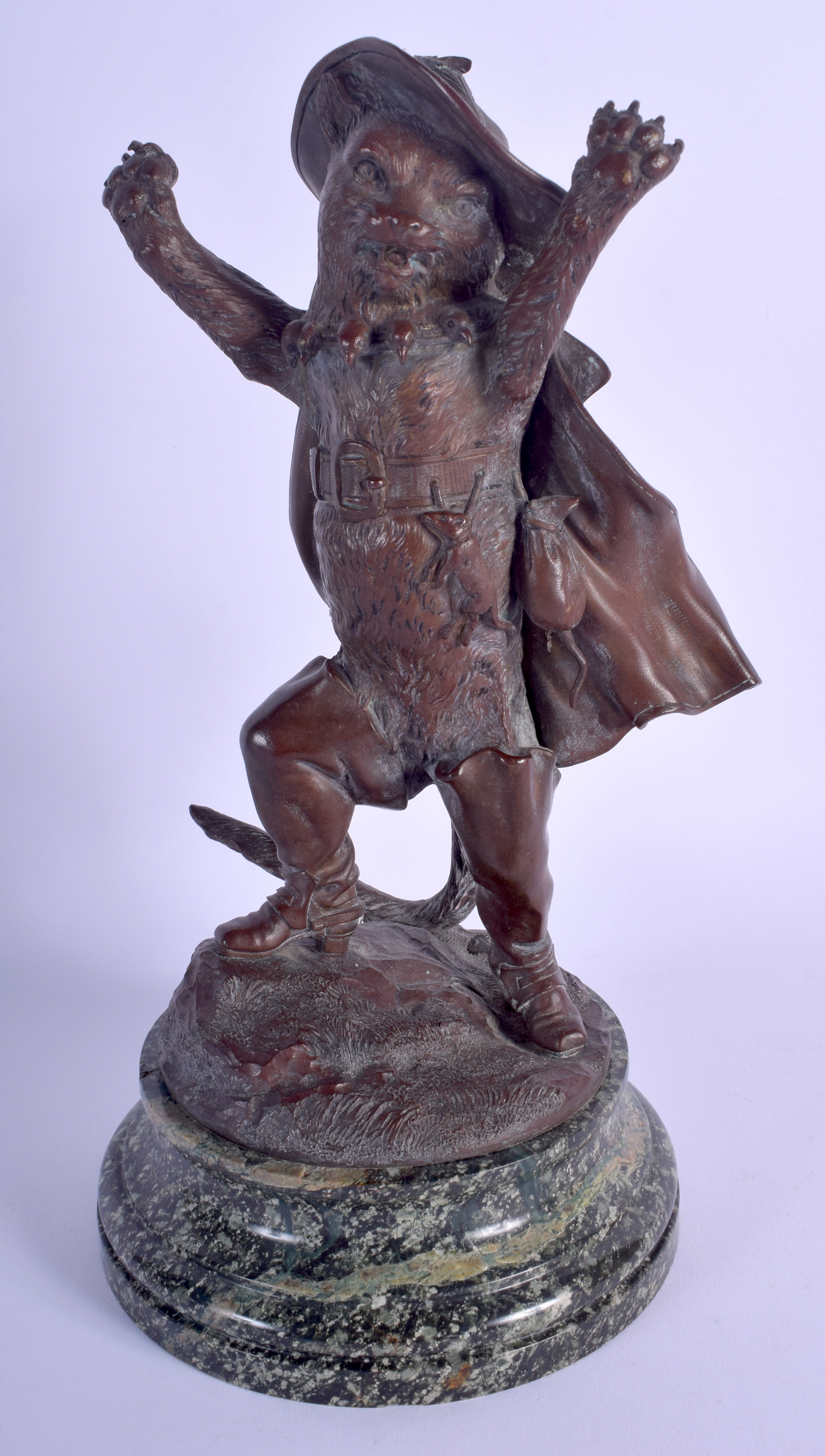 AN EARLY 20TH CENTURY EUROPEAN COLD PAINTED BRONZE FIGURE OF PUSS IN BOOTS modelled with hands rais