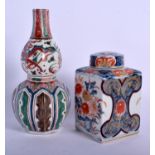 A 19TH CENTURY JAPANESE AO KUTANI PORCELAIN VASE together with an imari tea caddy. Largest 17 cm hi