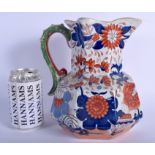 A LARGE 19TH CENTURY MASONS IRONSTONE IMARI JUG painted with flowers. 22 cm x 17 cm.