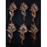 A group of Bronze Tibetan decorative wall fittings 36 cm