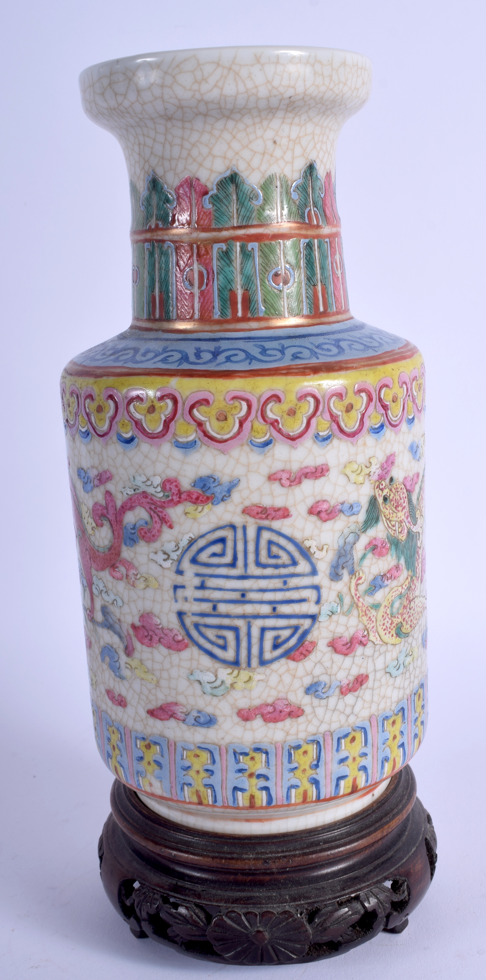 A 19TH CENTURY CHINESE FAMILLE ROSE PORCELAIN VASE Qing, painted with dragons. 22 cm high.