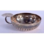 AN ANTIQUE SILVER WINE TASTER. 66 grams. 10 cm wide.