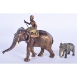 A 19TH CENTURY AUSTRIAN COLD PAINTED BRONZE ELEPHANT together with a small bronze elephant. Largest