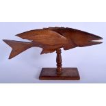 A PITCAIRN ISLANDS IVAN CHRISTIAN CARVED WOOD FLYING FISH. 31 cm wide.