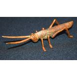 A small bronze Japanese locust 13 cm