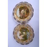 Coalport good pair of plates with pierced borders each painted with a named Welsh scenes, Mucruss A