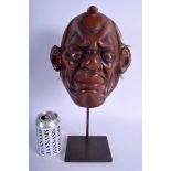 A LOVELY 18TH CENTURY JAPANESE EDO PERIOD RED LACQUERED NOH MASK modelled as a scowling male. Mask