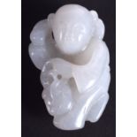 AN EARLY 20TH CENTURY CHINESE CARVED WHITE JADE FIGURE OF A BOY Late Qing/Republic. 4 cm x 2.75 cm.