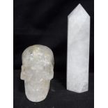 A crystal skull and a similar Obelisk largest 20cm