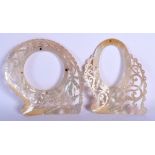 A PAIR OF 19TH CENTURY CONTINENTAL CARVED MOTHER OF PEARL SHELLS. 18 cm x 18 cm.