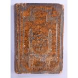 AN EARLY 20TH CENTURY JUDAIC BOOK with leather binding. 22 cm x 18 cm.
