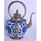 A CHINESE TIBETAN WHITE METAL MOUNTED PORCELAIN TEAPOT 20th Century. 13 cm x 19 cm.