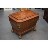 A LOVELY REGENCY CARVED MAHOGANY SARCOPHAGUS WINE COOLER with bold lion mask head handles. 70 cm x