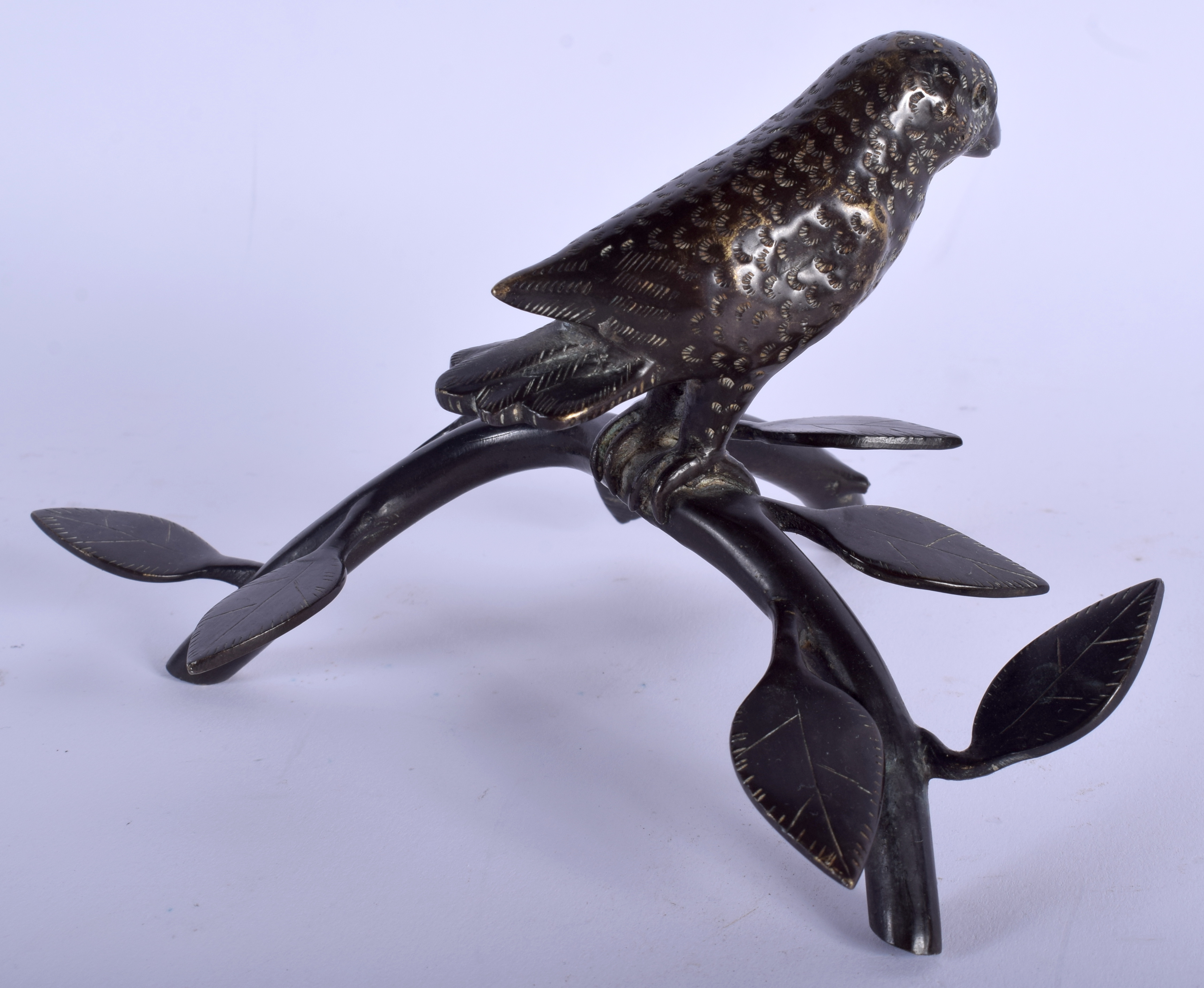 A MIDDLE EASTERN INDIAN BRONZE FIGURE OF A BIRD modelled upon a naturalistic branch. 14 cm x 11 cm. - Image 2 of 3