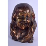 AN EARLY 20TH CENTURY CONTINENTAL PATINATED BRONZE BUST modelled as a female. 17 cm x 10 cm.