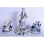 A PAIR OF 19TH CENTURY GERMAN AUGUSTUS REX PORCELAIN FIGURES together with a large matching figure.