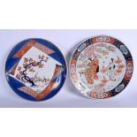 A LARGE PAIR OF 19TH CENTURY JAPANESE MEIJI PERIOD IMARI DISHES painted with foliage. 30 cm diamete