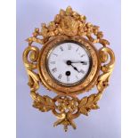 AN ANTIQUE PAINTED GILT METAL CARTEL CLOCK formed with foliage. 25 cm x 19 cm.