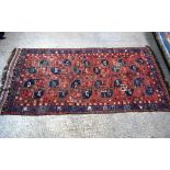 An Antique Caucasian Talish red ground rug. 330cm x 163cm