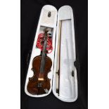 A cased Violin with amplification fittings