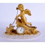 AN EARLY 19TH CENTURY FRENCH EMPIRE ORMOLU CHERUB CARRIAGE CLOCK upon a rock crystal base. 25 cm x