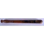 AN ANTIQUE PAINTED WOOD TRUNCHEON. 37 cm long.