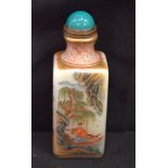 Chinese snuff bottle decorated with figures in landscapes. 8.5 cm