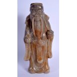 A CHINESE CARVED JADE FIGURE OF AN IMMORTAL 20th Century. 23.5 cm high.