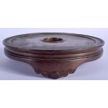 A 17TH CENTURY CHINESE BRONZE CENSER STAND Ming/Qing, of plain form. 21.5 cm wide, internal width 1