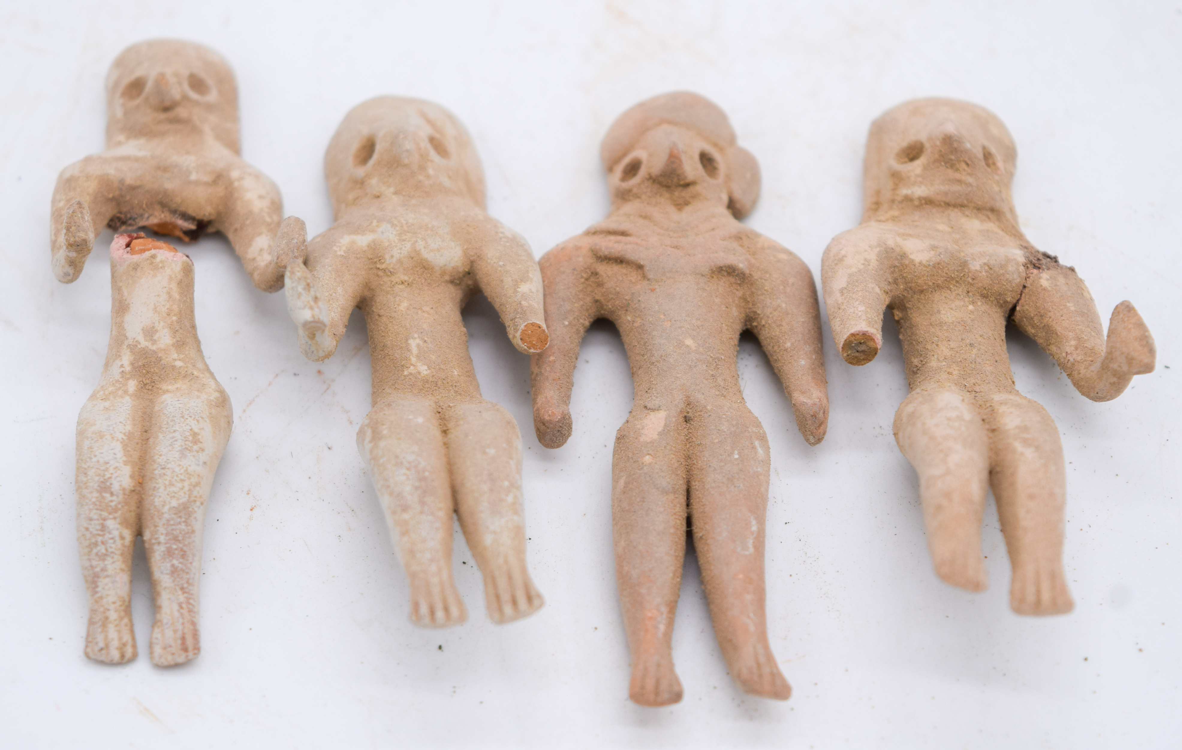 Four small Egyptian stone figures 8.5cm